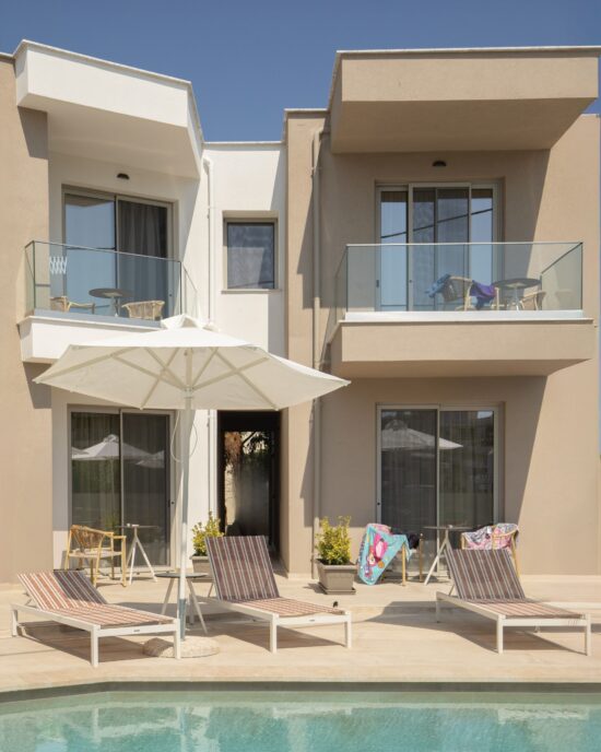 Outside view of the pool and the apartments
